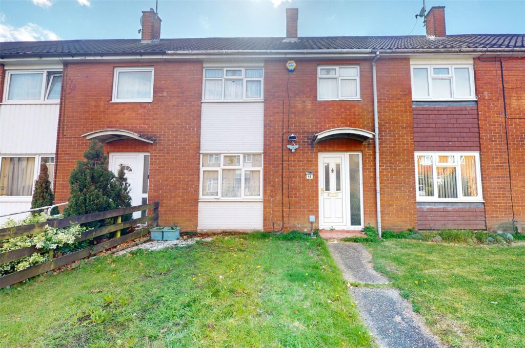 Three bedroom terraced house with detached garage to rear