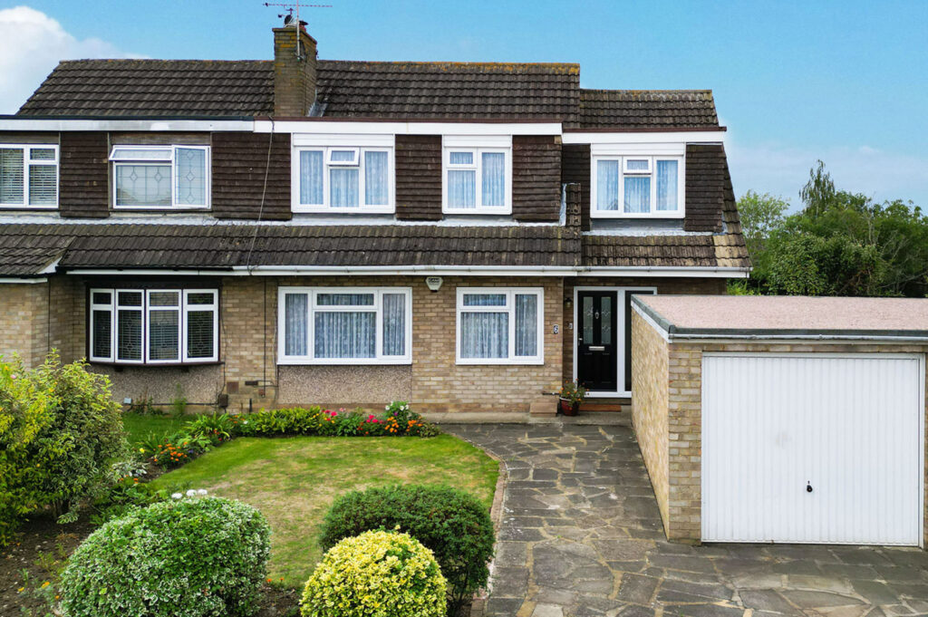 Extended Four bedroom semi detached house with Garage and driveway